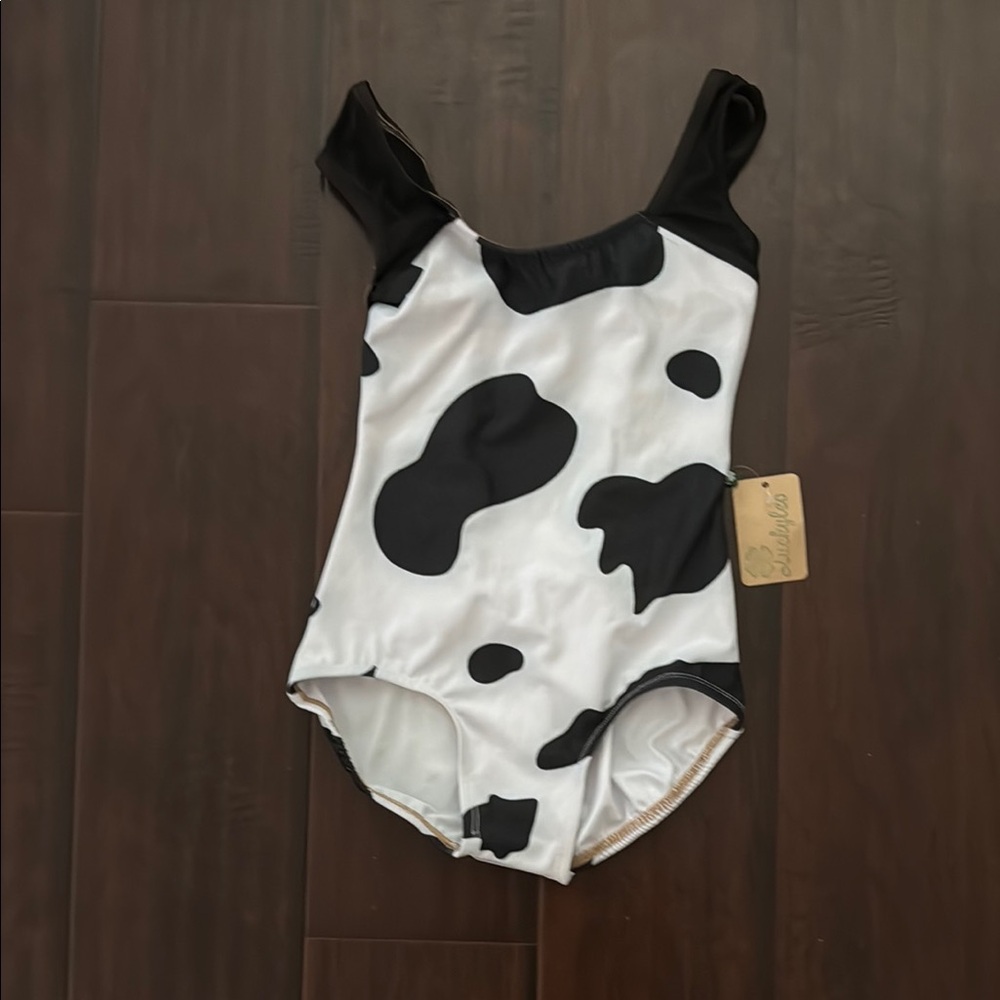 NWT LUCKY LEO.  Cow print leotard.